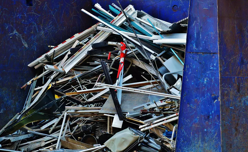 Aluminium extrusions, sections and sheet offcuts in a stillage